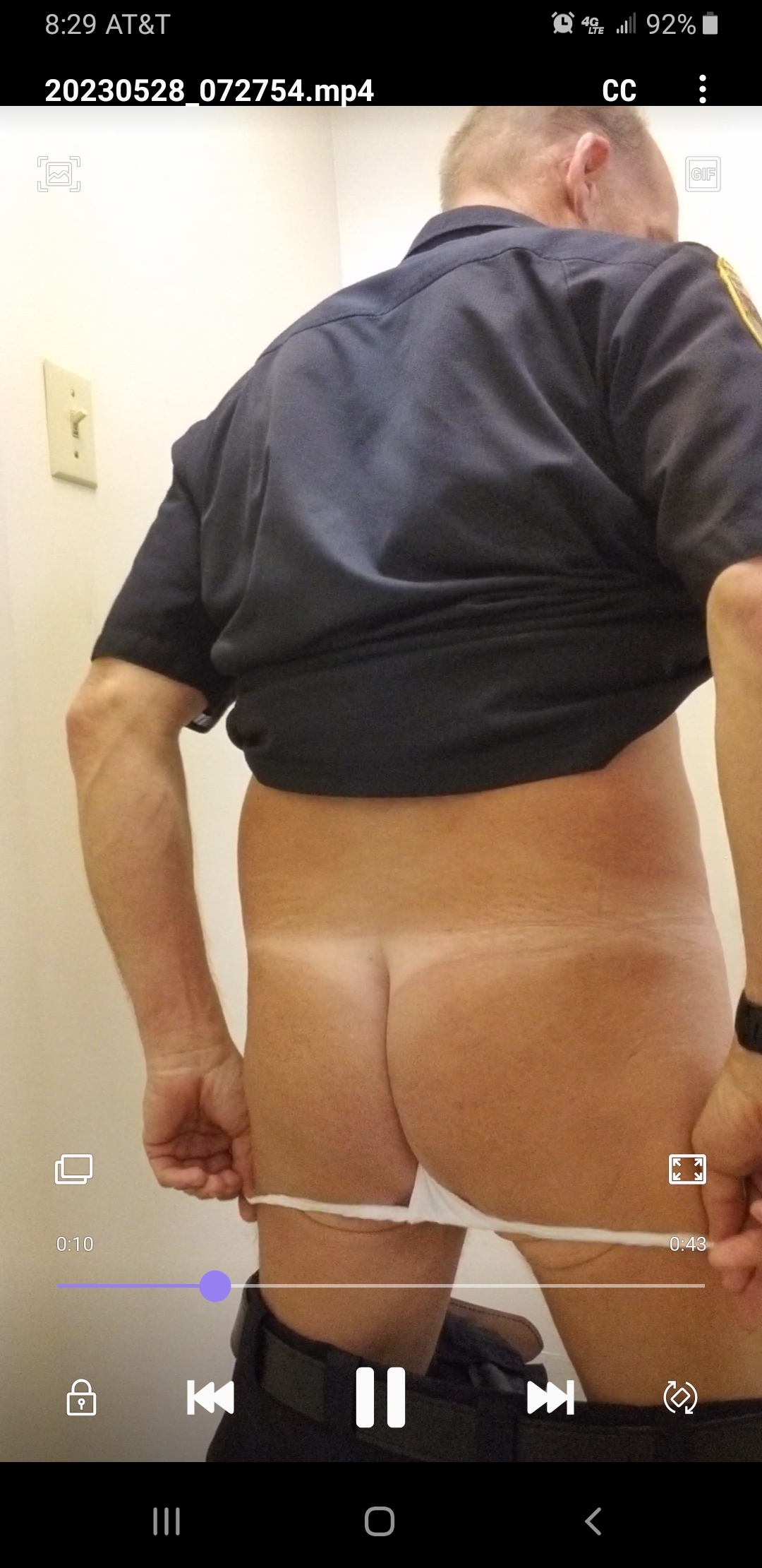 Cop changing at work