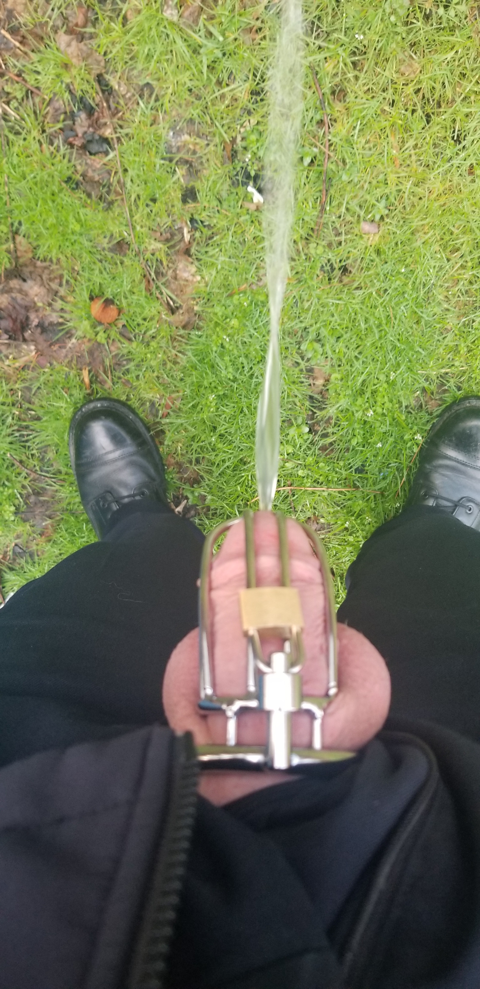 Cop caged piss outside