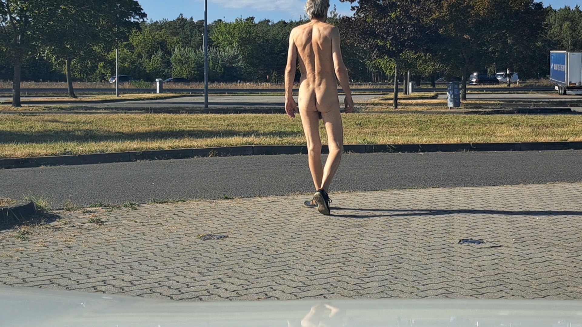 Naked at parking