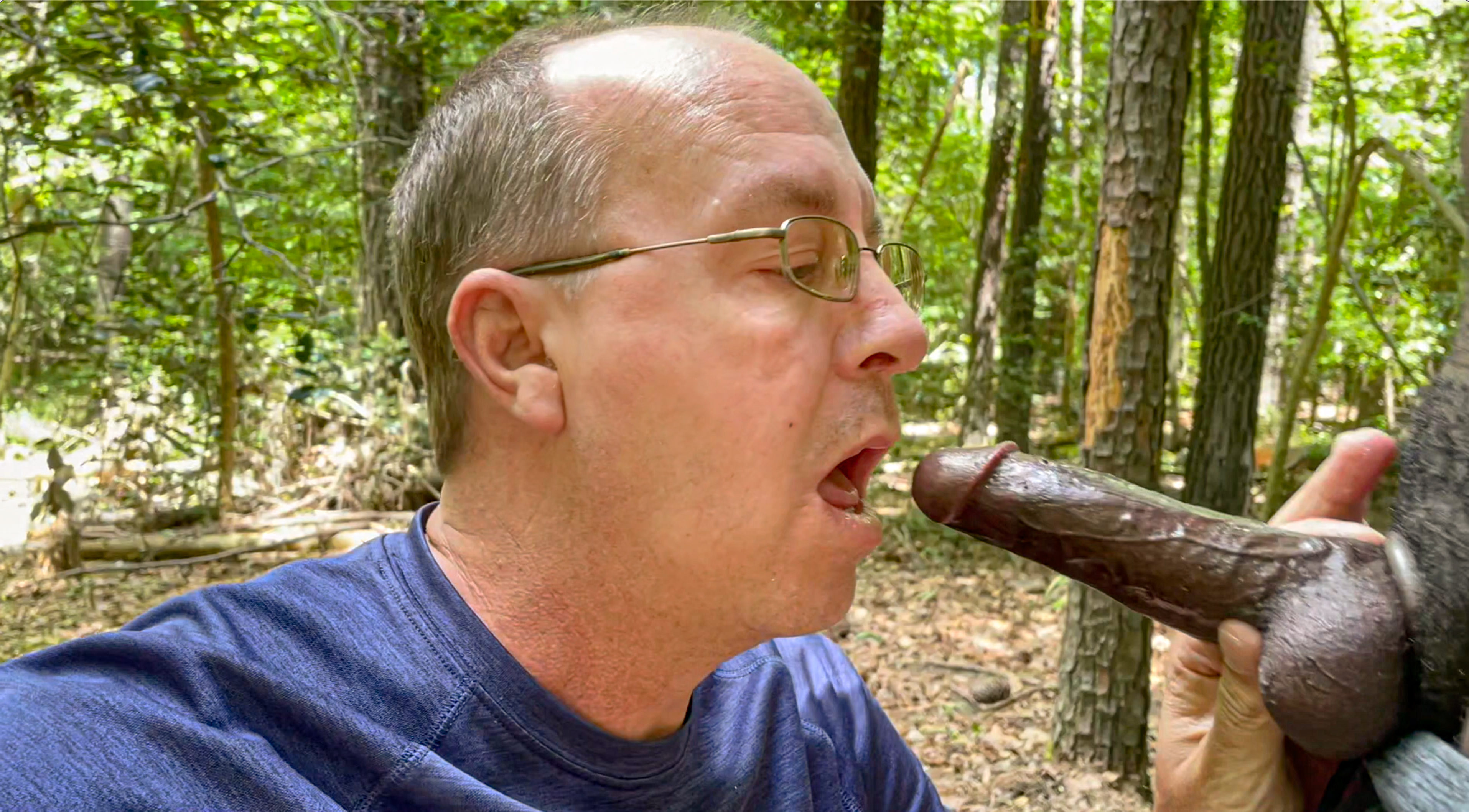 Brad Chaplin sucking a big black cock