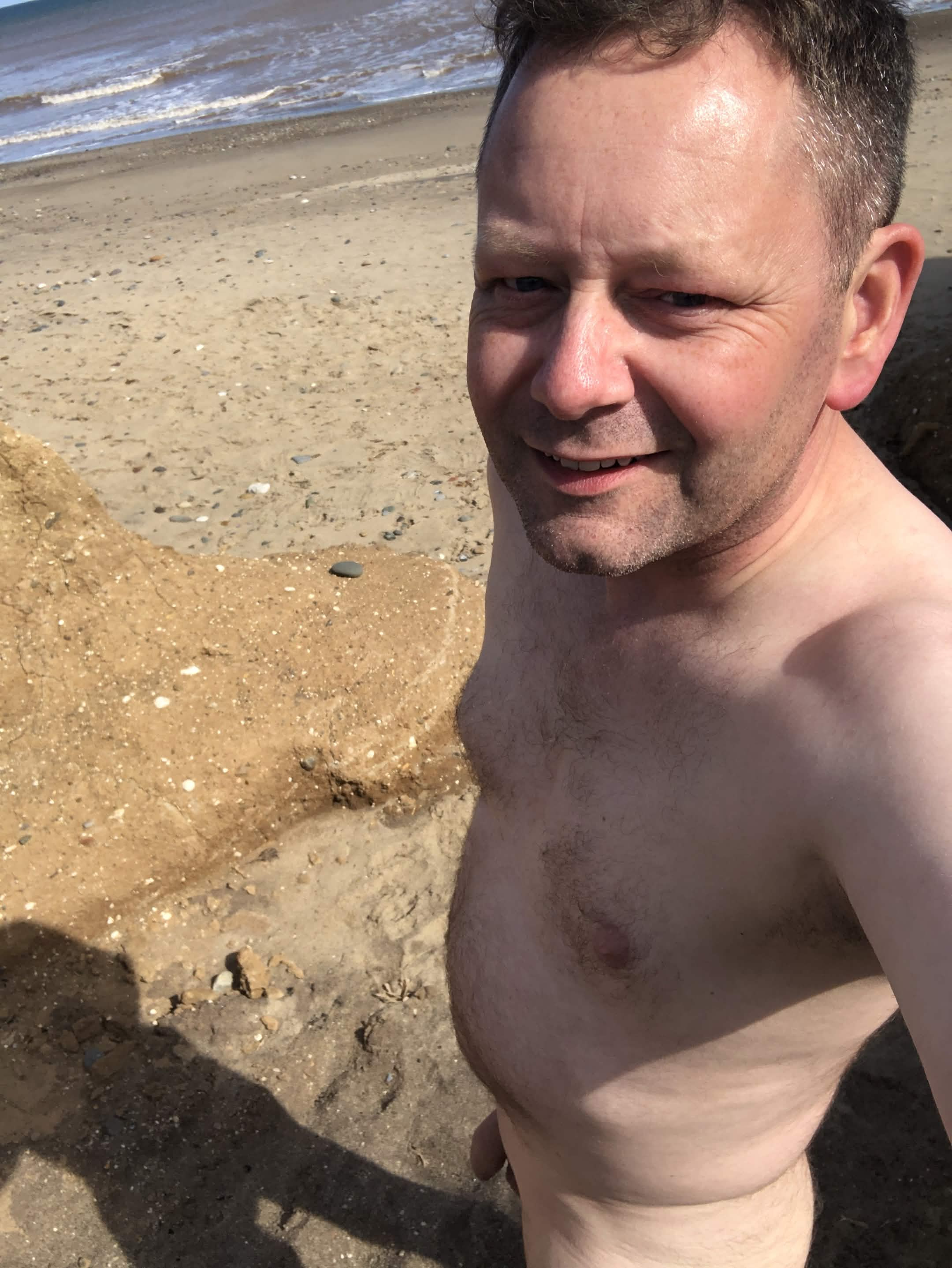 Naked on the beach
