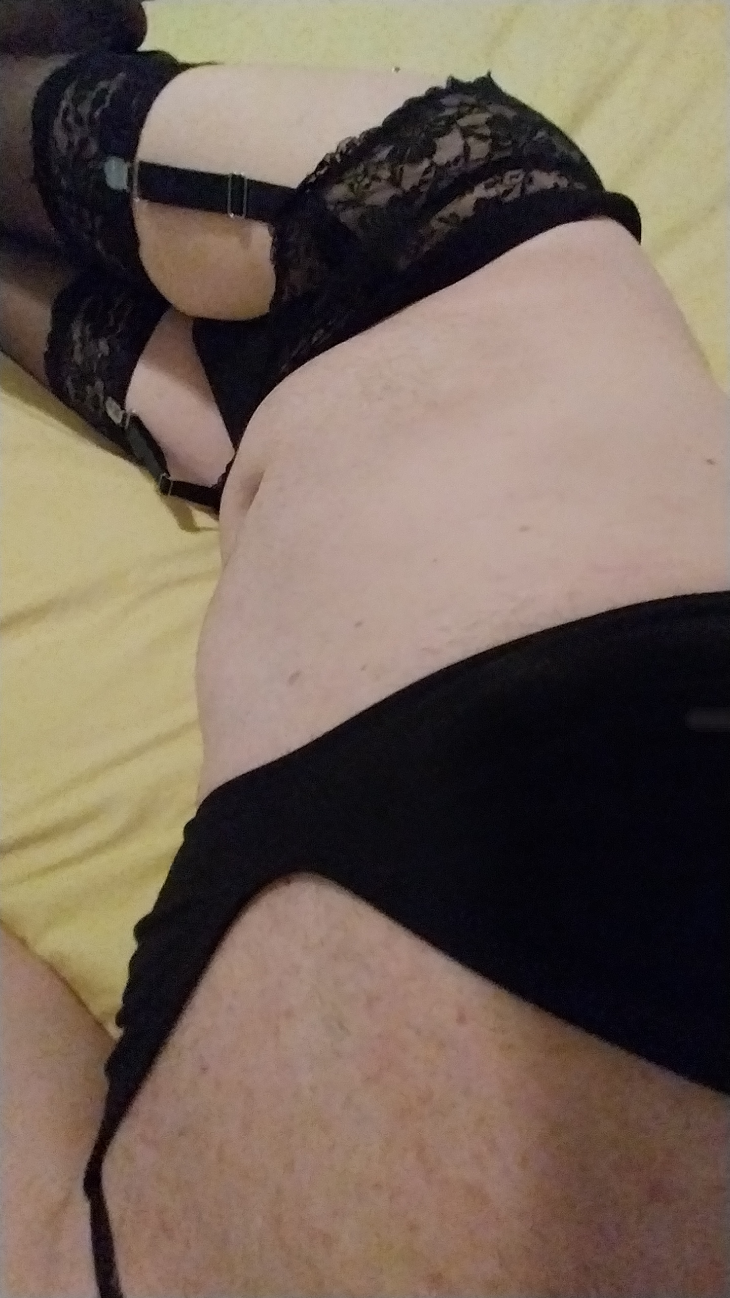 Woman's legs with a small penis
