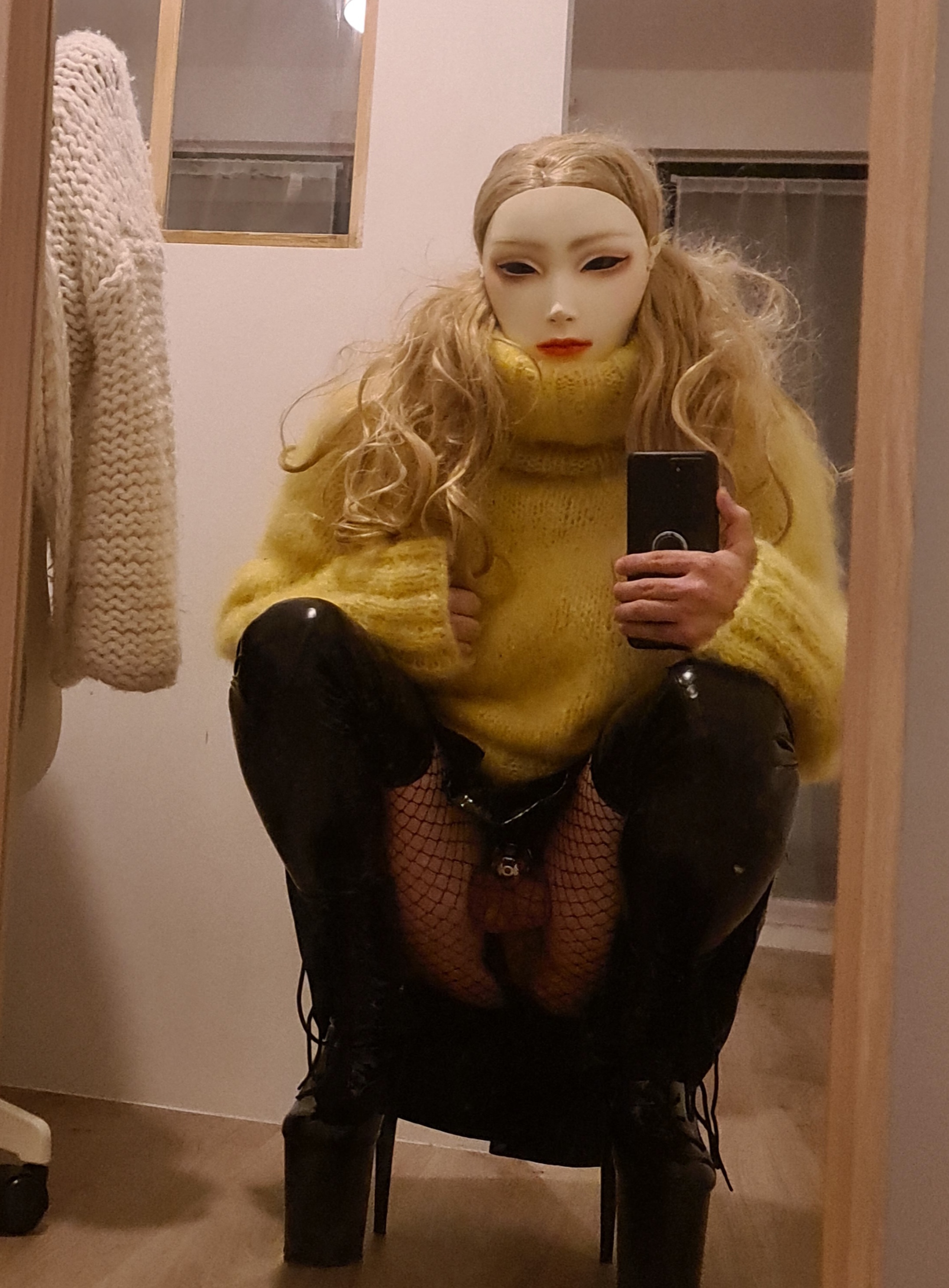 Caged wool doll
