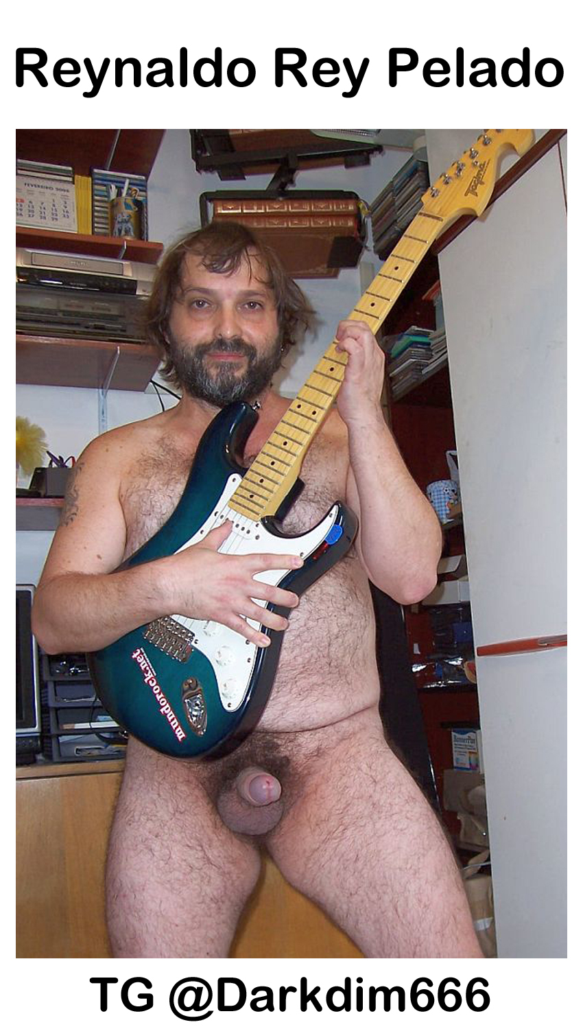Reynaldo playing guitar naked