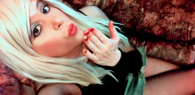 Michele Blowing kiss