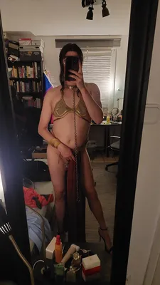 This princess is locked in her cage and collar!