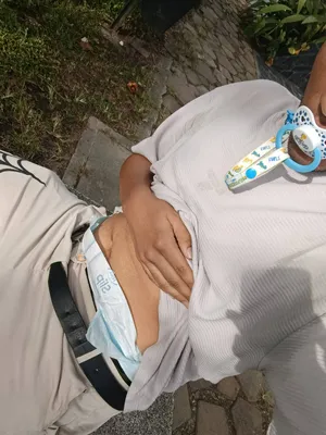 Wearing a diapee and paci outside