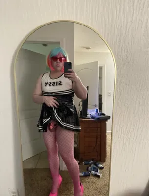 Caged sissy slut