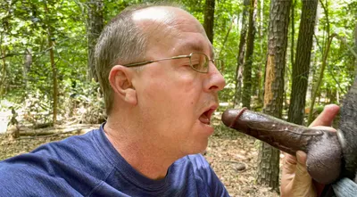 Brad Chaplin sucking a big black cock