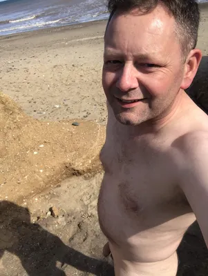 Naked on the beach